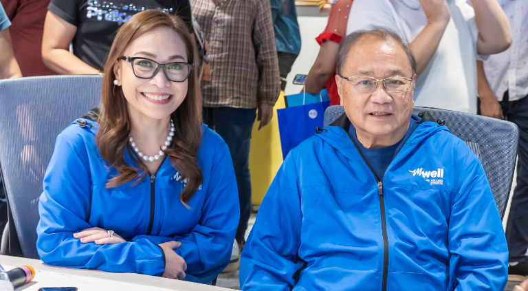 MPIC Chief Finance, Risk and Sustainability Officer and mWell CEO Chaye Cabal-Revilla with MPIC Chairman and CEO, Manny V. Pangilinan | CebuFinest