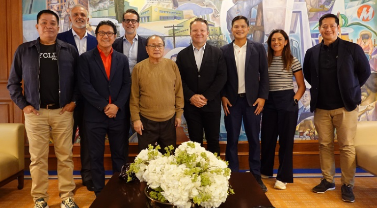 PLDT Chairman and CEO Manuel V. Pangilinan with Fédération Internationale de Volleyball (FIVB) officers and Philippine National Volleyball Federation (PNVF) president Ramon Suzara (3rd from left) and Secretary-General Don Caringal (rightmost). | CebuFinest